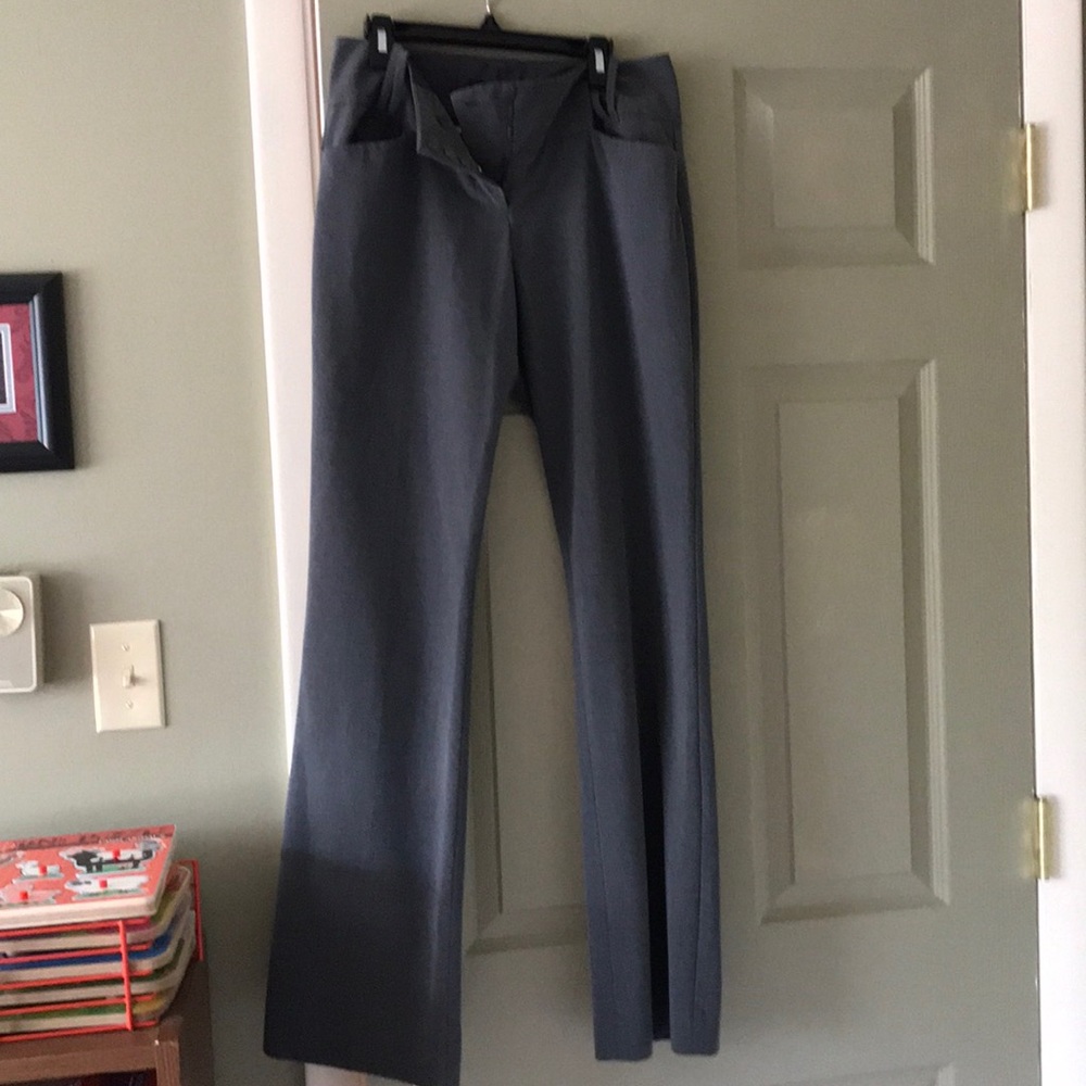 Light gray Cassidy fit dress pants. Flared leg